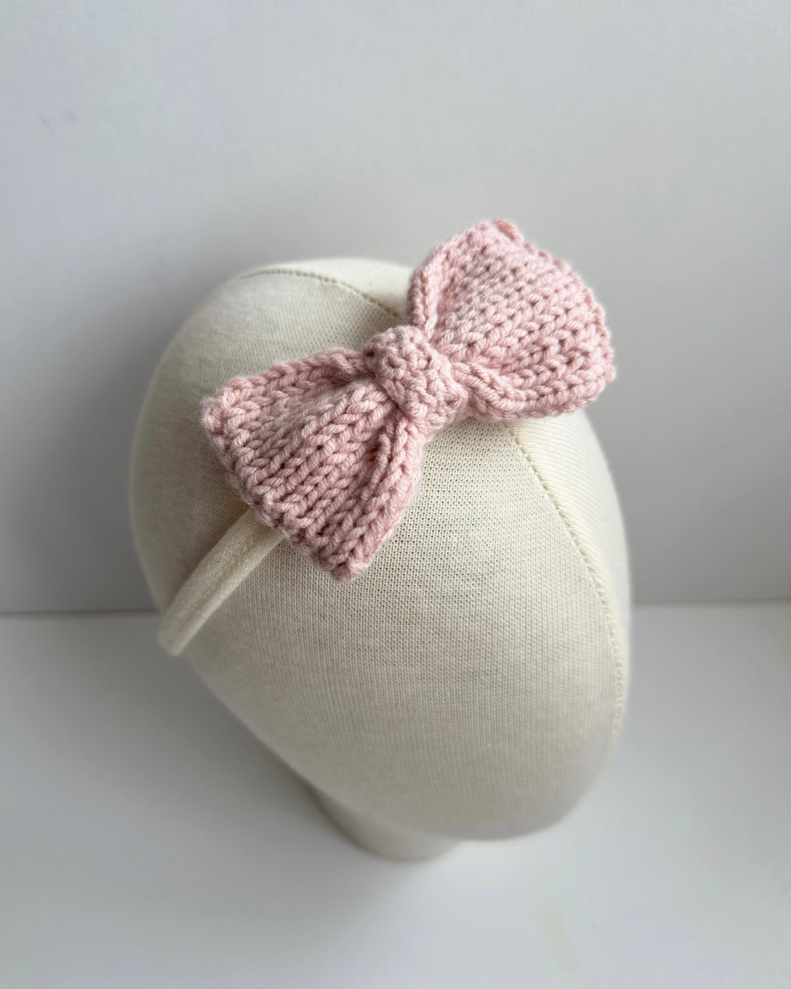 Pink knitted headband